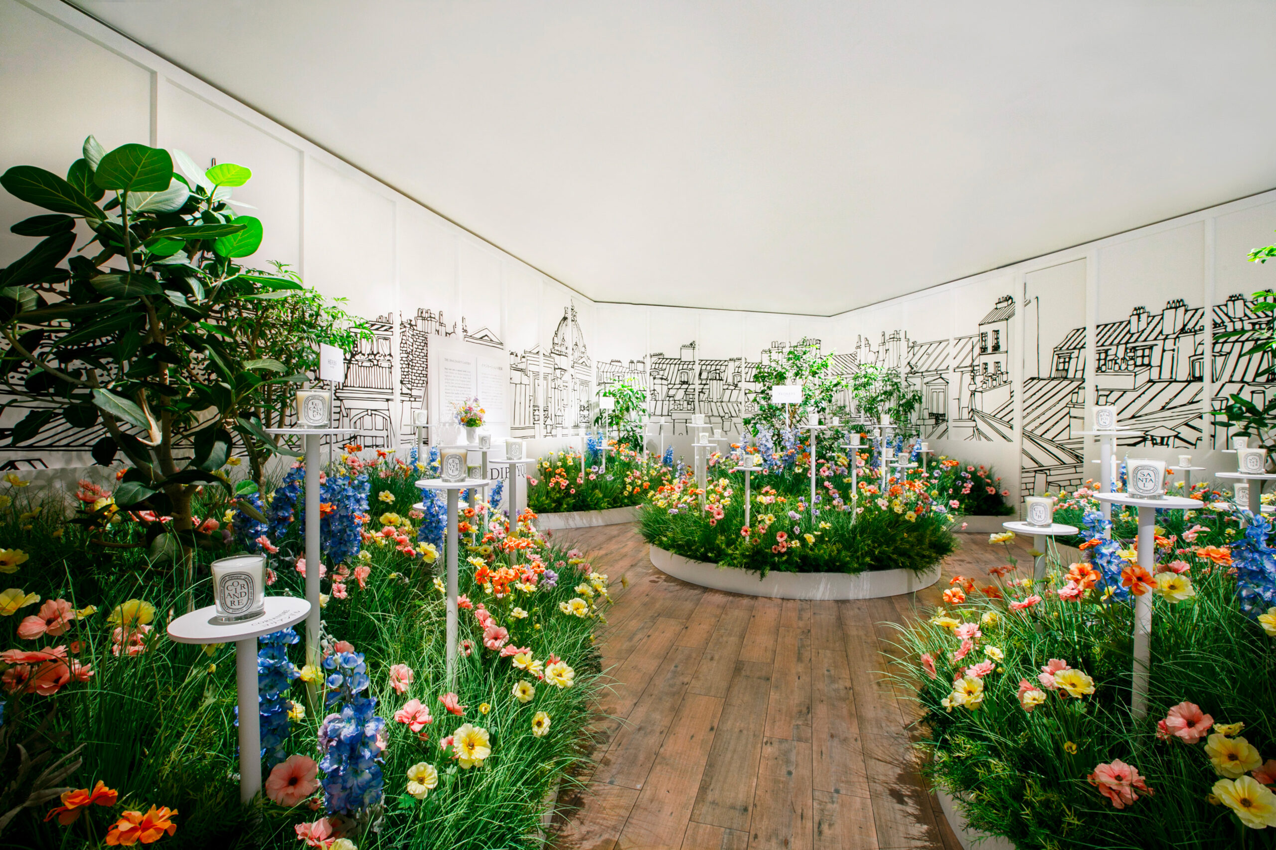 Interior product display of perfumes and candles in garden set for Diptyque Un Air de Paris Pop Up store in Tokyo by Golden Mama