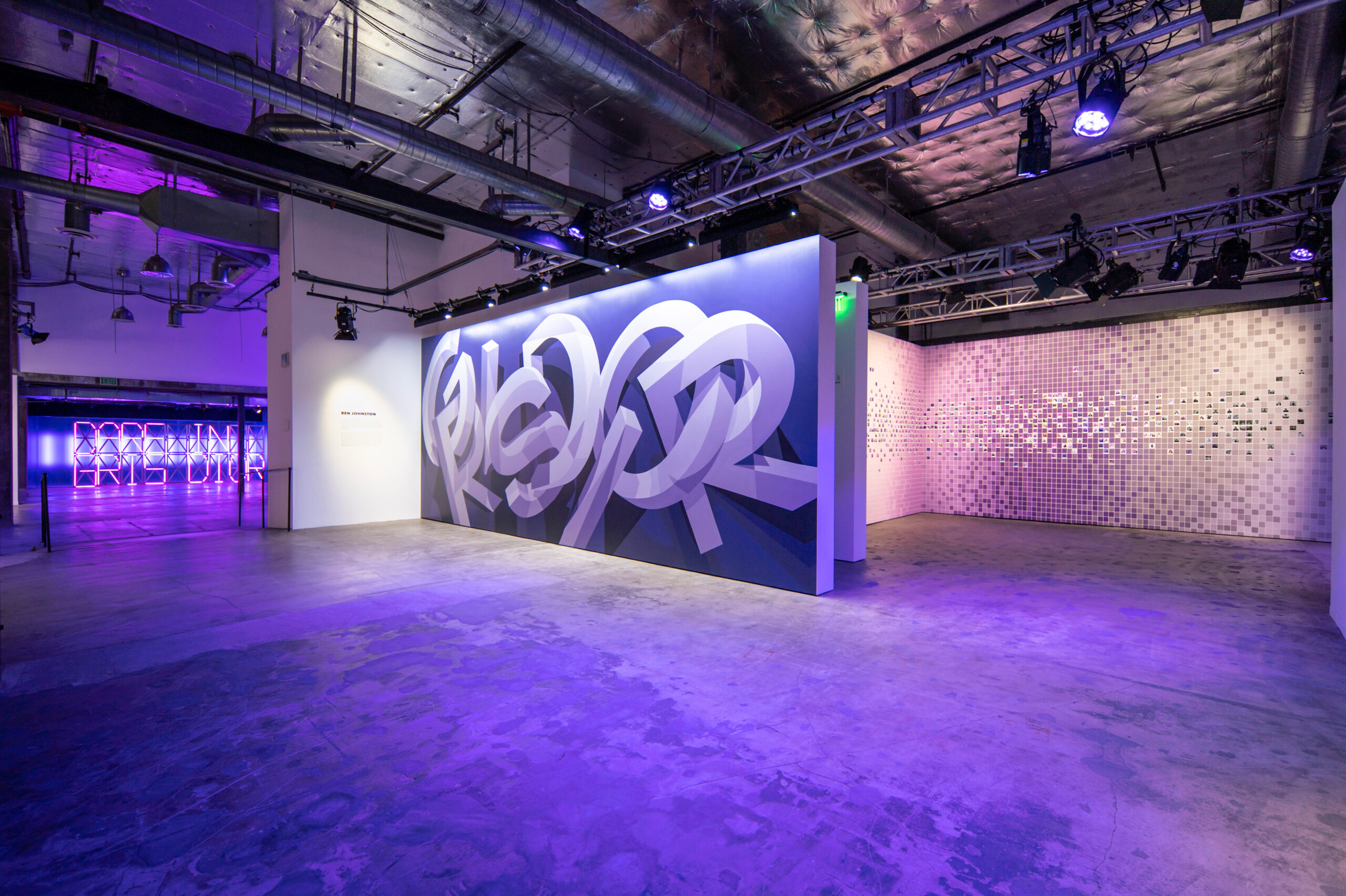 Set design of The Grey Zone exhibition enhancing Gris Dior fragrance with Ben Jonhston art work.	