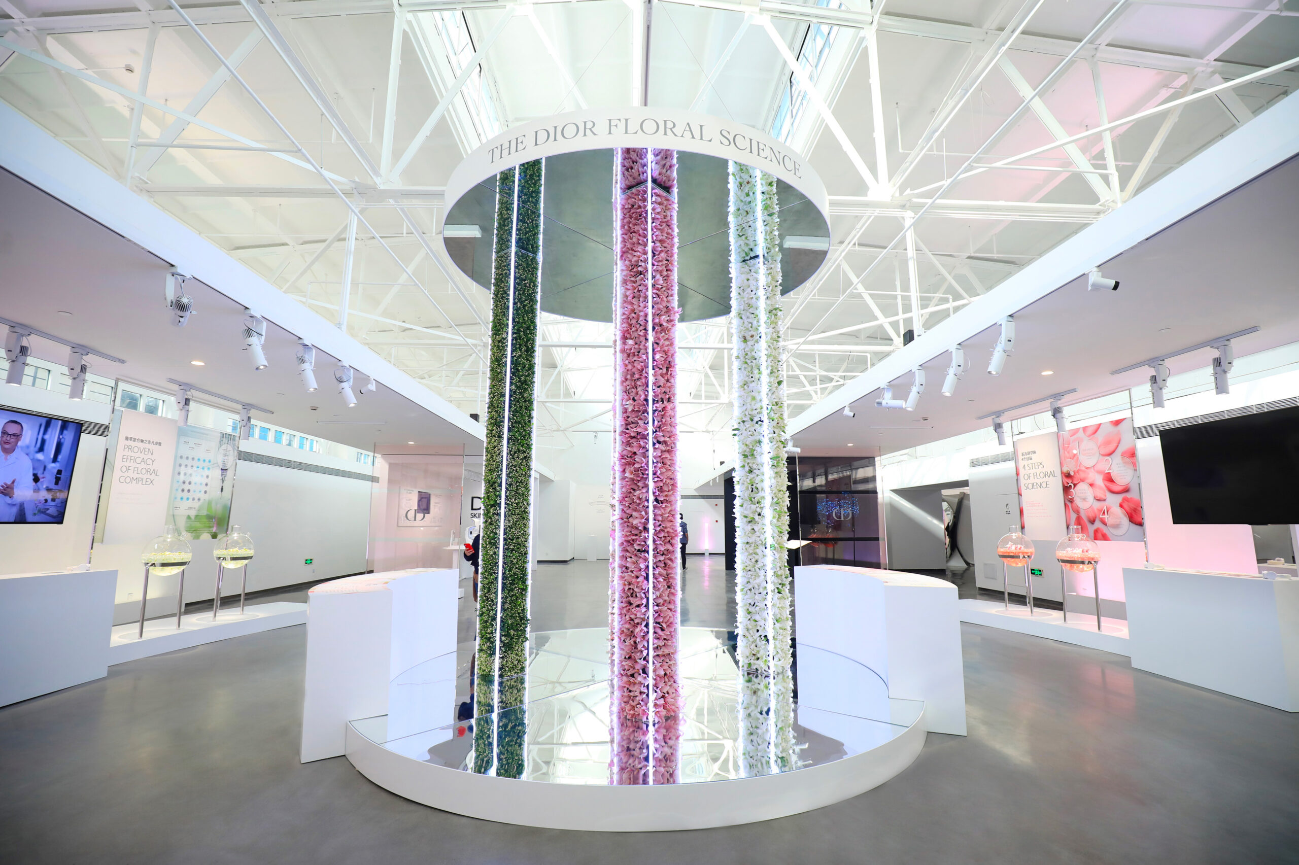 Flowers display created by Golden Mama, enhancing the components of Dior's skincare products on a Dior exhibition.