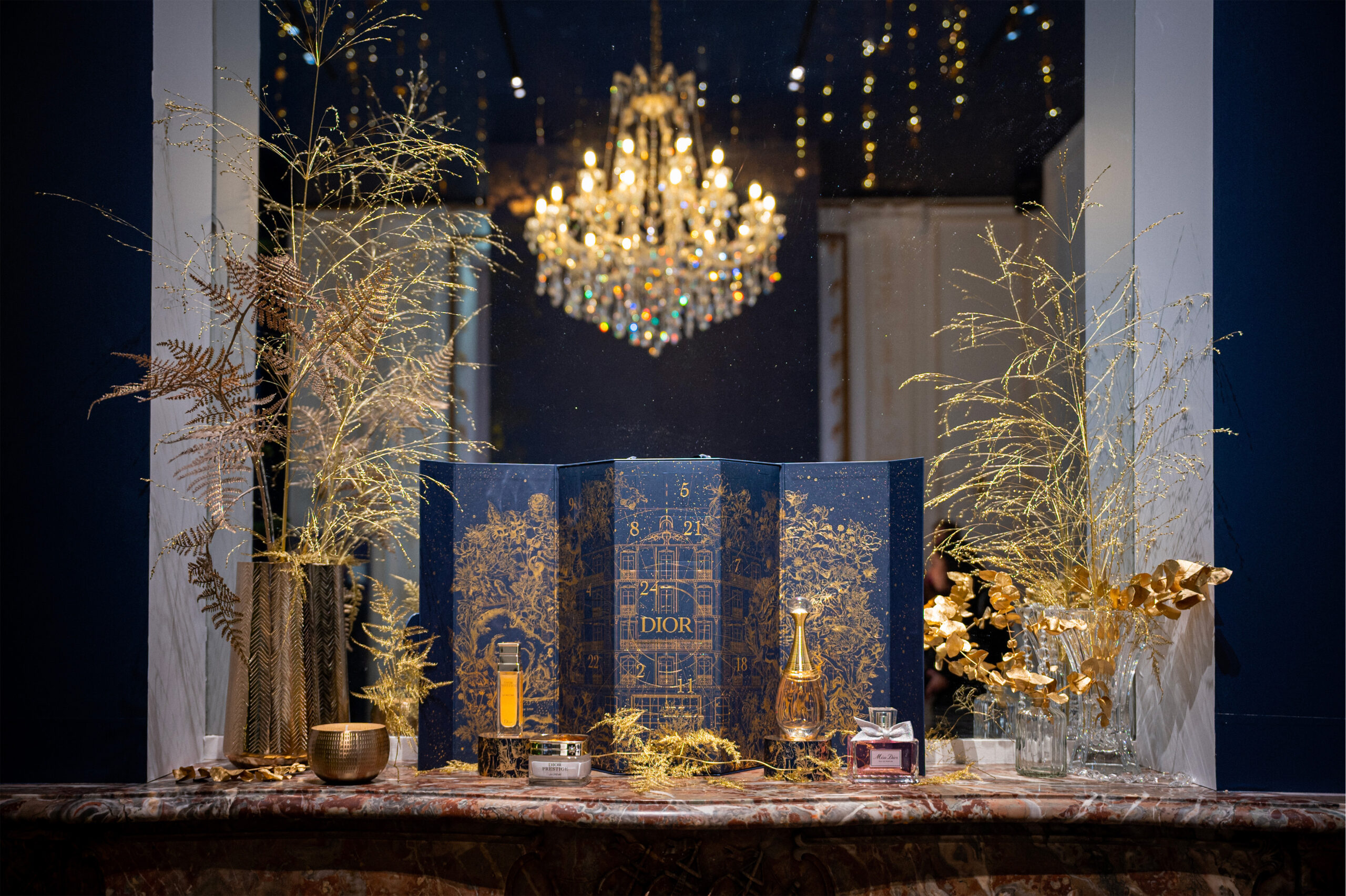 Fragrances display at L'Atelier des Rêves Dior in Paris, designed by Golden Mama.