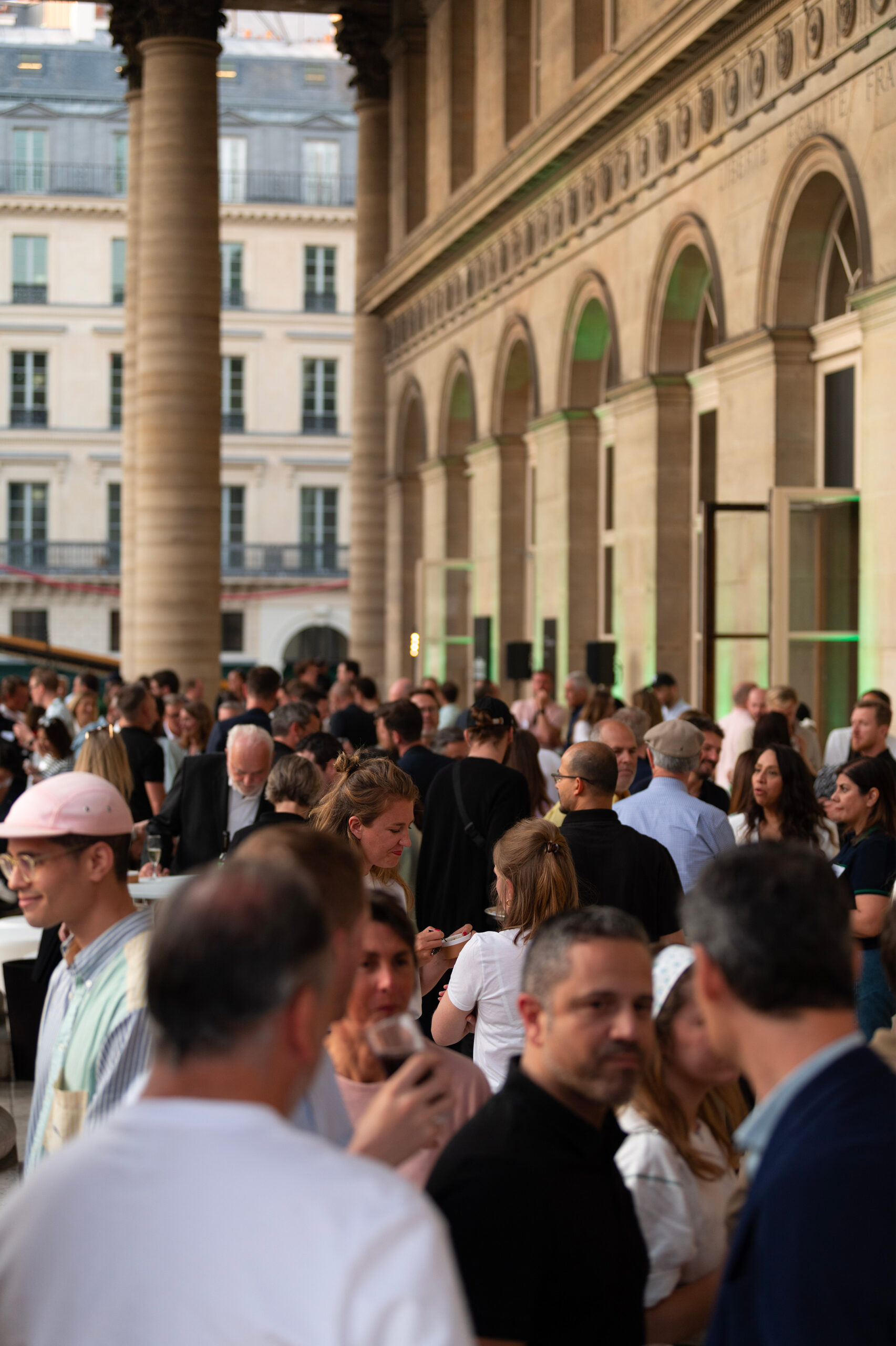 Fashion show exterior in Paris with guests chatting outside. Guests management, scouting and castings by Golden Mama for Lacoste