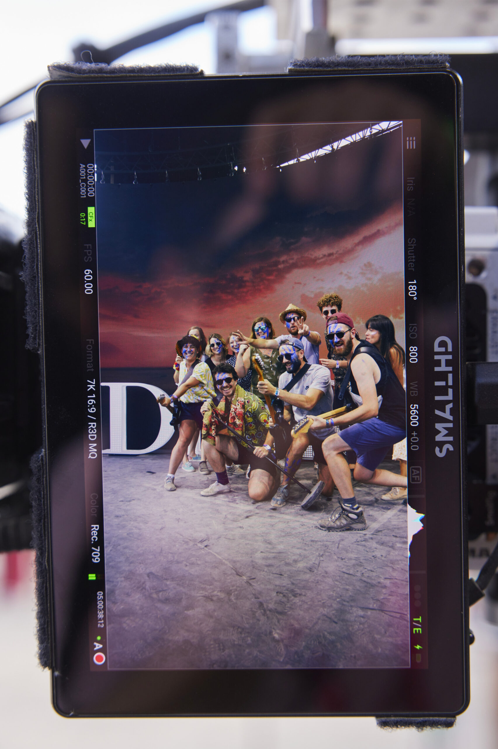 Festival-goers enjoying an immersive experience on the Dior Sauvage stage at Rock en Seine music festival.