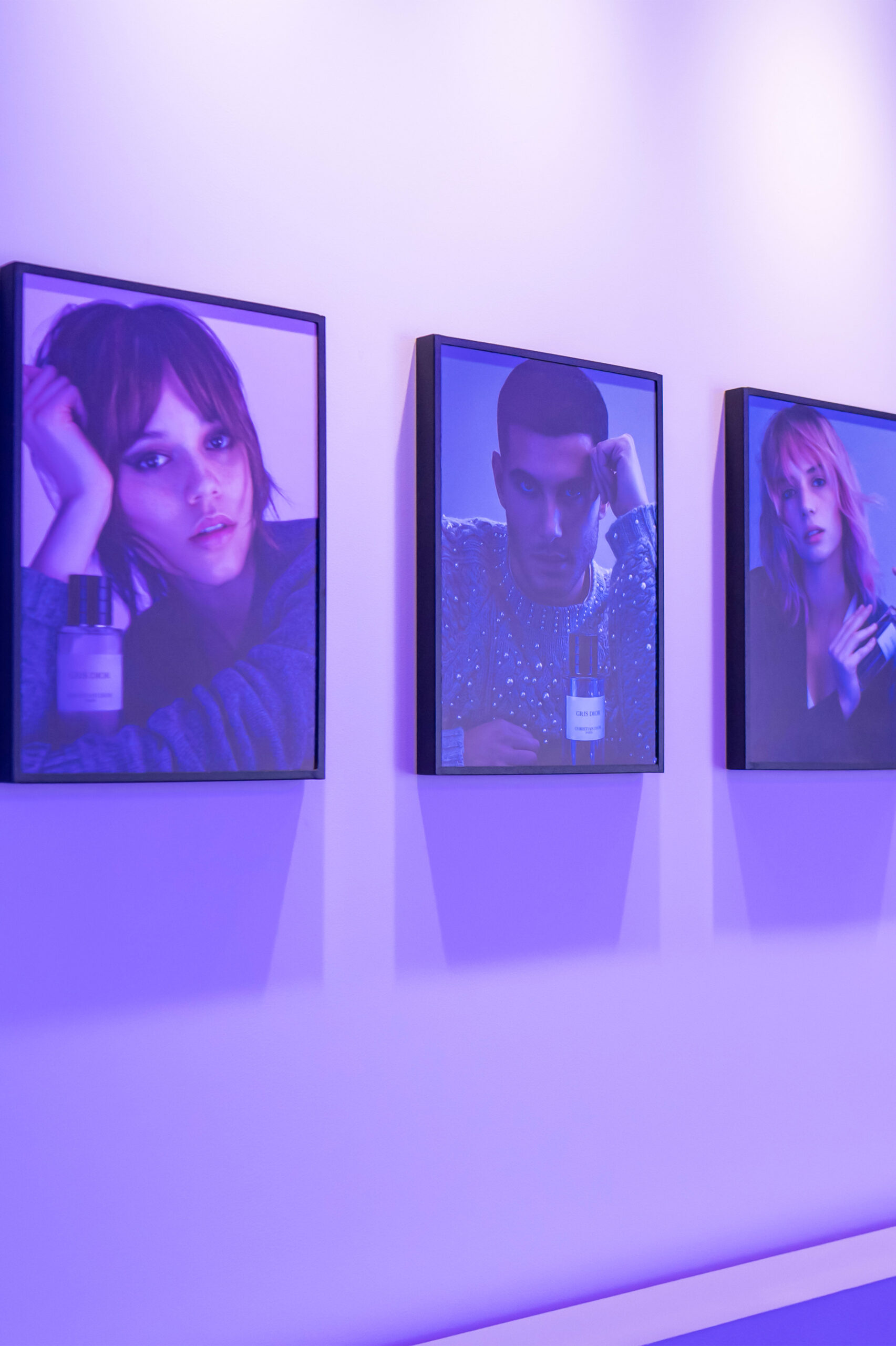 Posters of the Gris Dior's muses, Jenna Ortega, Fai Khadra and Maya Hawke displayed at The Grey Zone Dior.