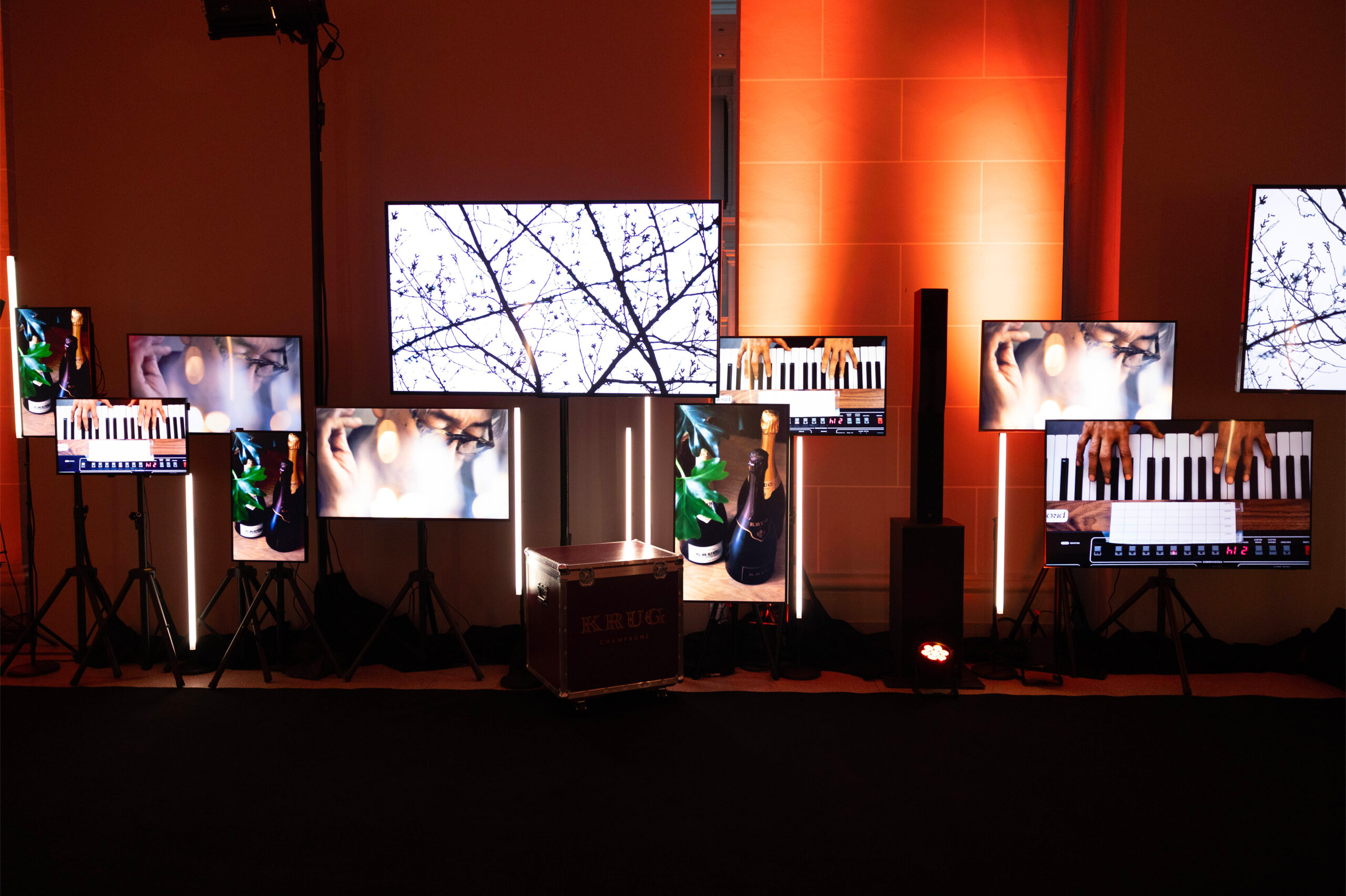 Krug x Ryuichi Sakamoto empty scenography with screen display for luxury event music dinner experience produced by Golden Mama