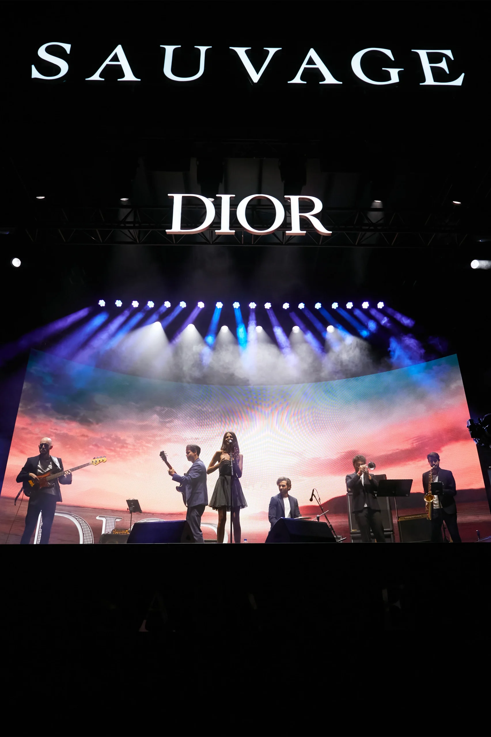 Music artist performing on the Dior Sauvage stage at Rock en Seine music festival, stage greated by Golden Mama.