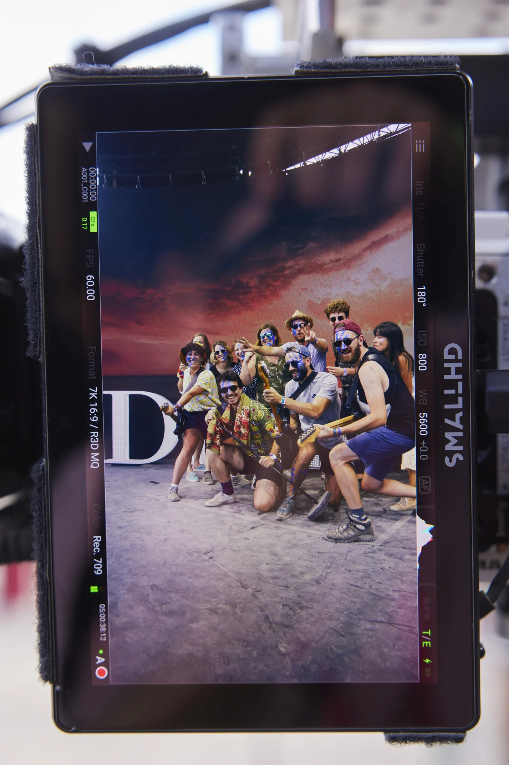Festival-goers enjoying an immersive experience on the Dior Sauvage stage at Rock en Seine music festival.